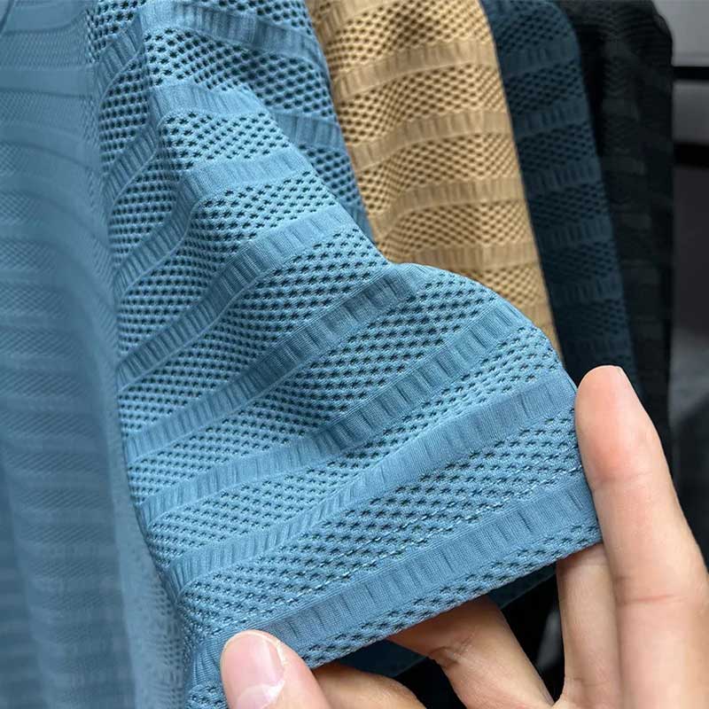 Les t-shirts à l'équipe de maille sec actif pour hommes